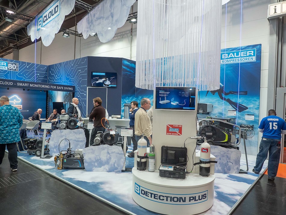 Exhibition stand dedicated to diving technologies and underwater safety, showcasing advanced equipment.