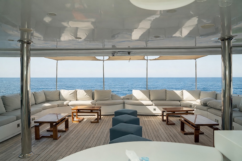 Elegant lounge space on a yacht, ideal for relaxing after a scuba dive.