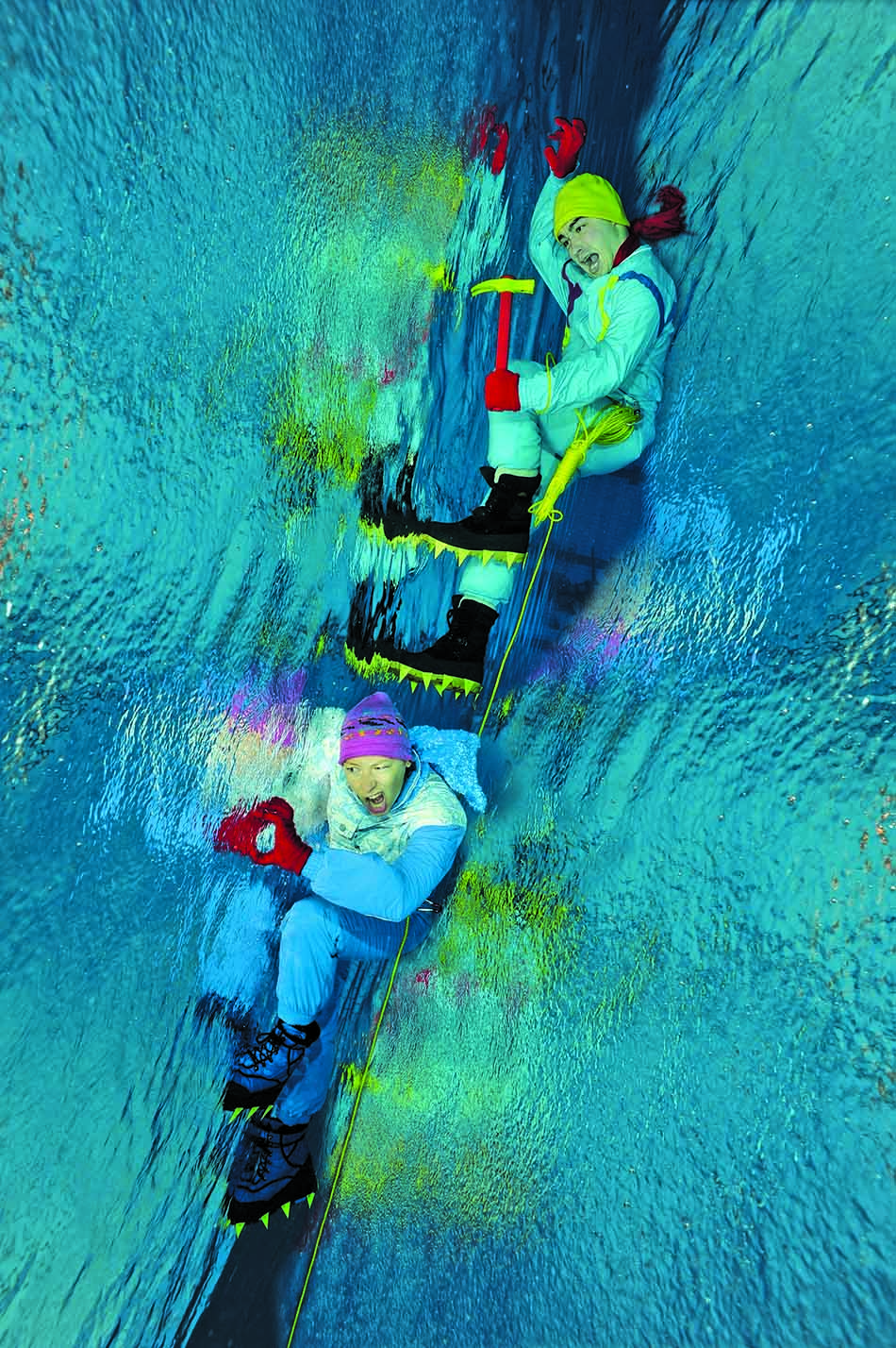 Two adventurers explore a colorful underwater world, combining diving and ice climbing.