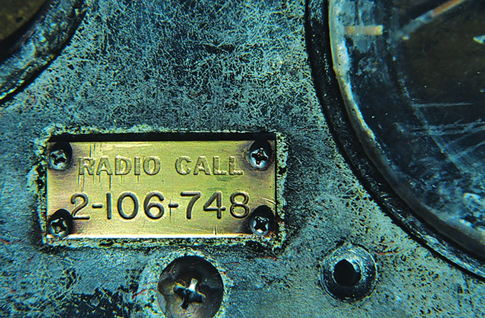 Identification plate of underwater equipment, essential for diving and ocean exploration.
